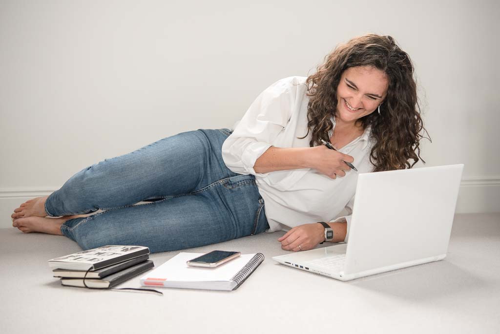 Brand photographer Edinburgh woman lying on floor