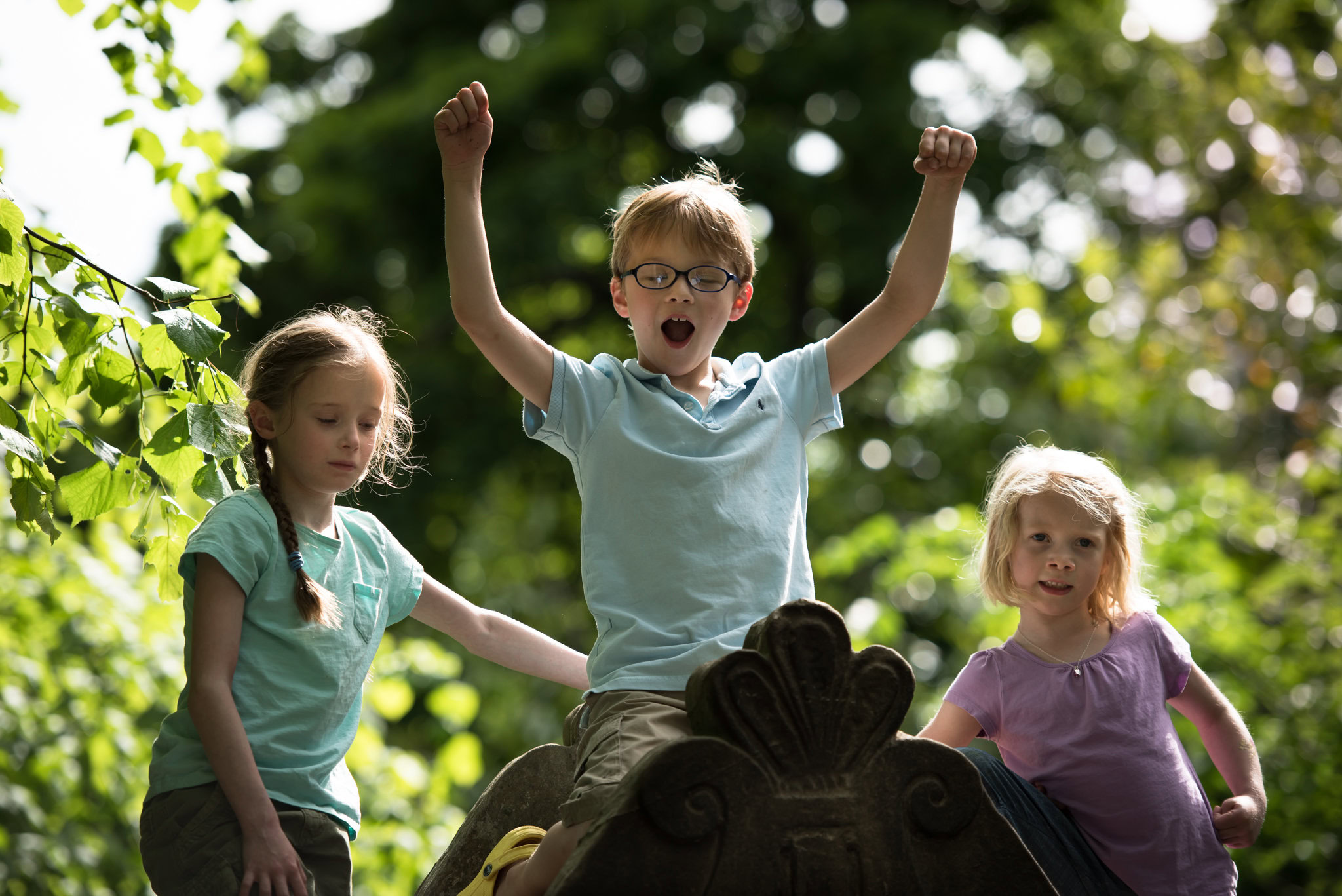 Family photographer Edinburgh Portrait Photographer - three children playing outdoors at Lauriston Castle