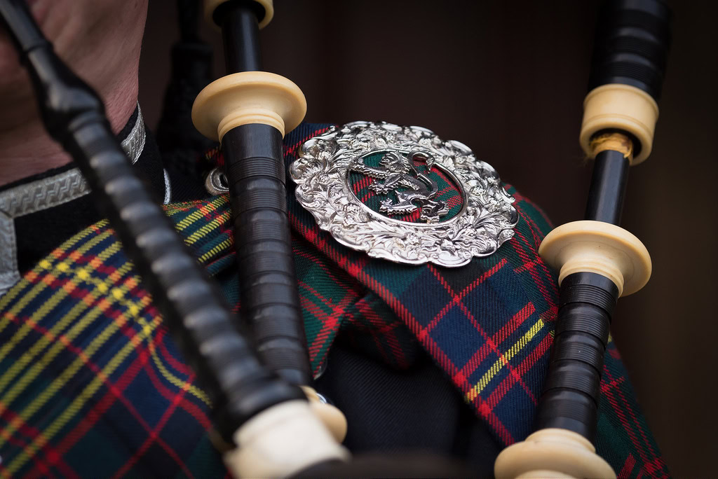 Personal Branding Photographer Edinburgh - bagpipe drones and plaid brooch