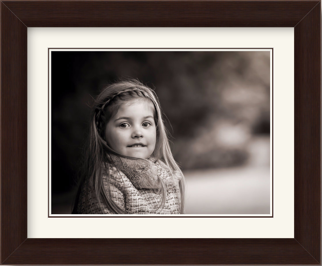 Sepia framed portrait of little girl, head and shoulders
