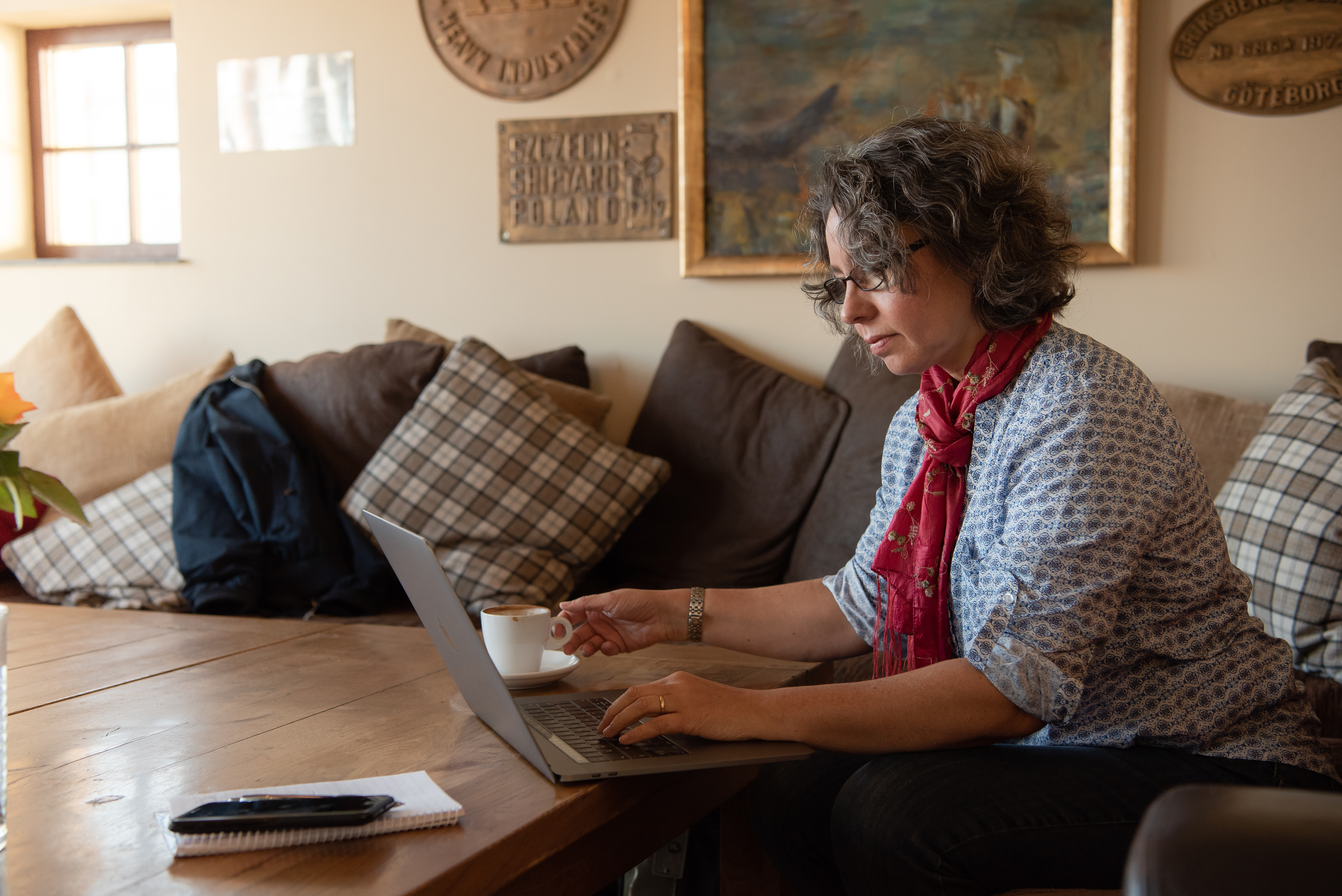 Personal Branding Photographer Edinburgh - woman working on laptop in cafe