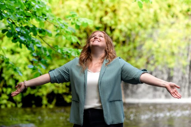 Brand photoshoot in Edinburgh, Scotland, of a therapist at a waterfall