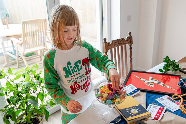 Little girl with Christmas sweets