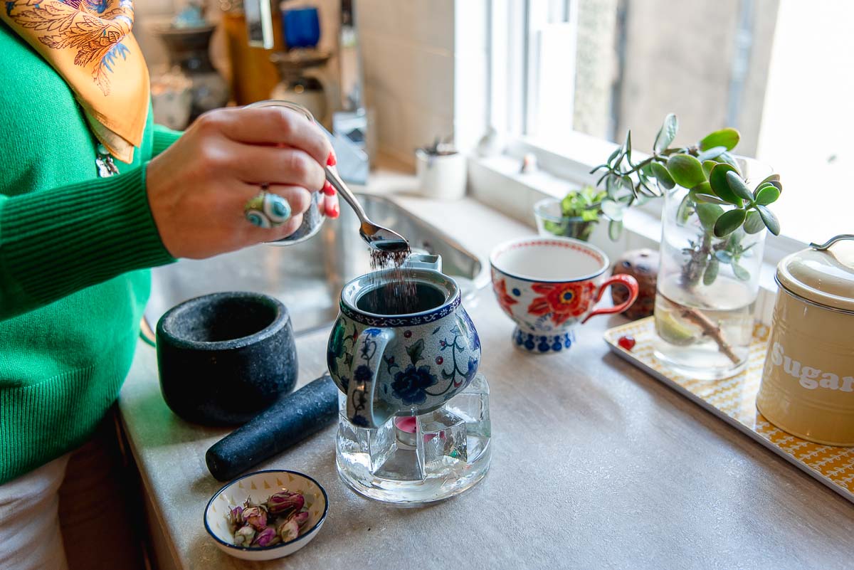 Woman making loose tea