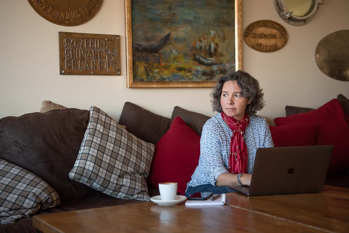 Woman sitting at laptop