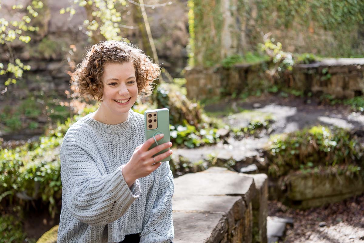 Woman taking selfie on ph one