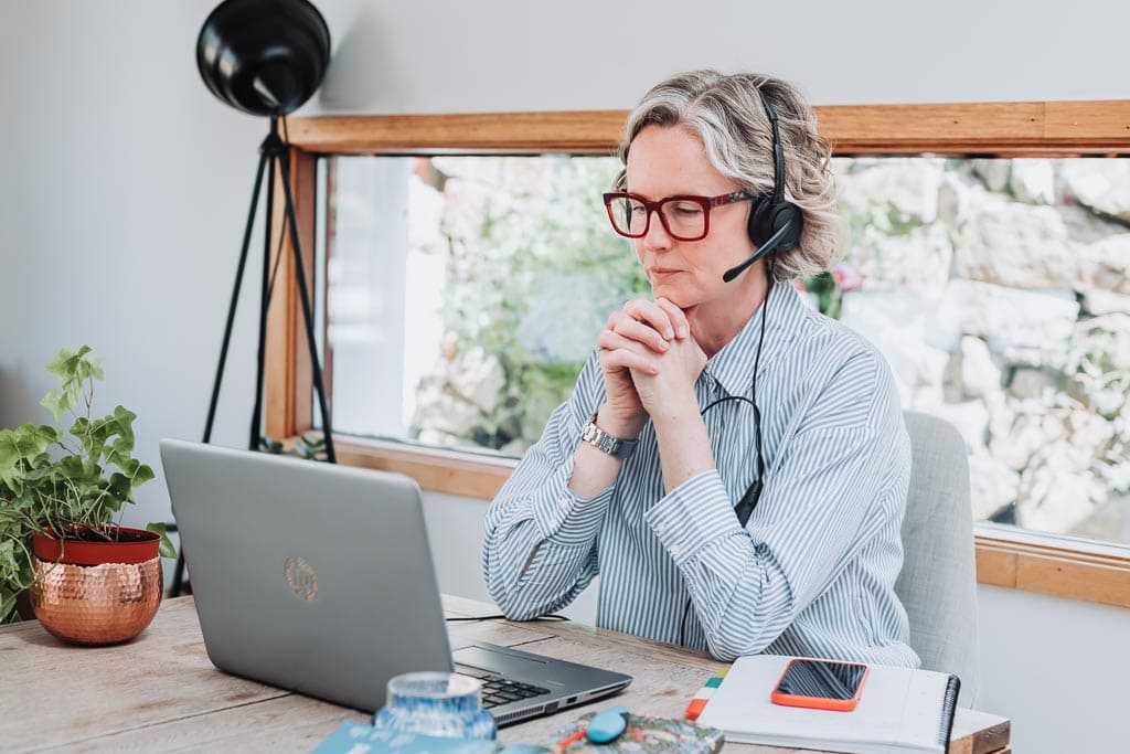Executive assistant Sarah Whigham on a Teams call during her brand photography photo shoot in Edinburgh, Scotland