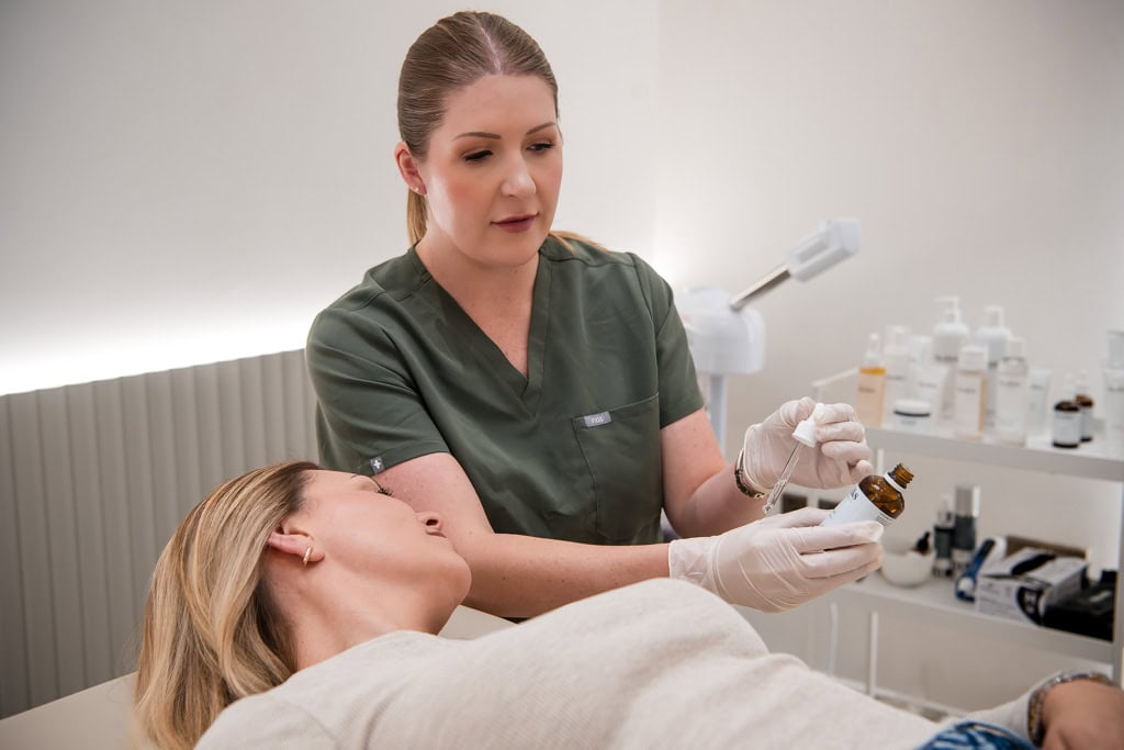 Feeling ready for brand photography - aesthetician small business owner in  Edinburgh Scotland working on her client 