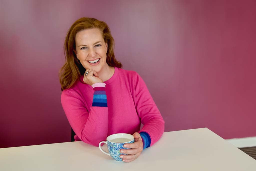Business brand photography in Glasgow showing consultant Yvonne Anderson smiling at the camera